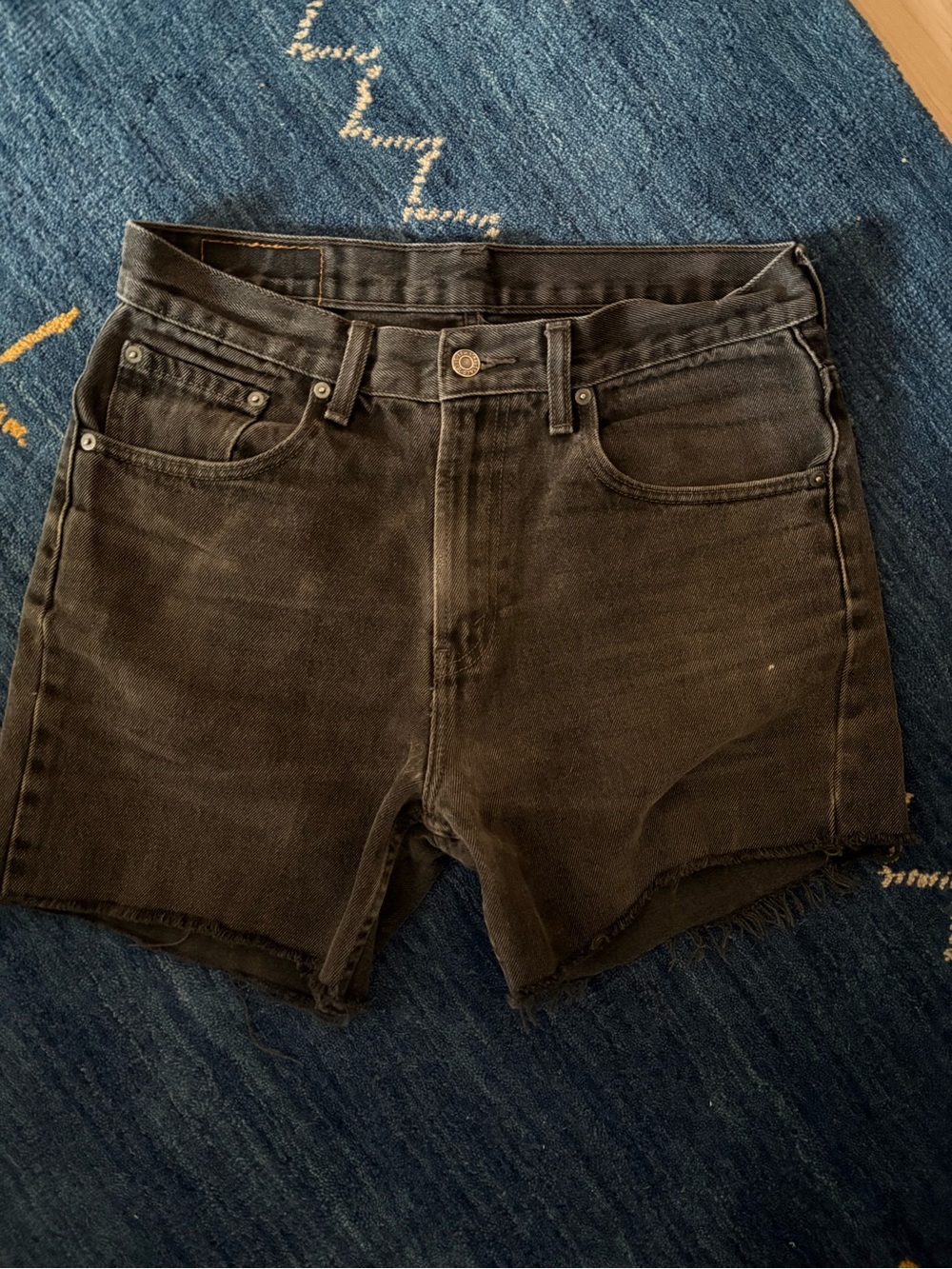 Levi’s High-Rise Black Denim Cutoff Shorts